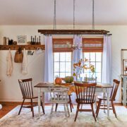 dining room with ladder as lighting fixture