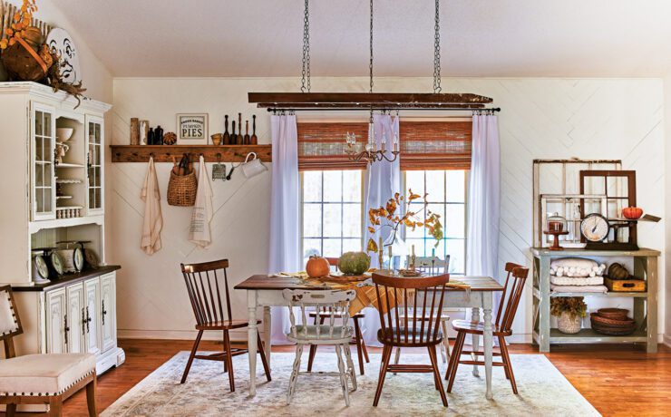 dining room with ladder as lighting fixture