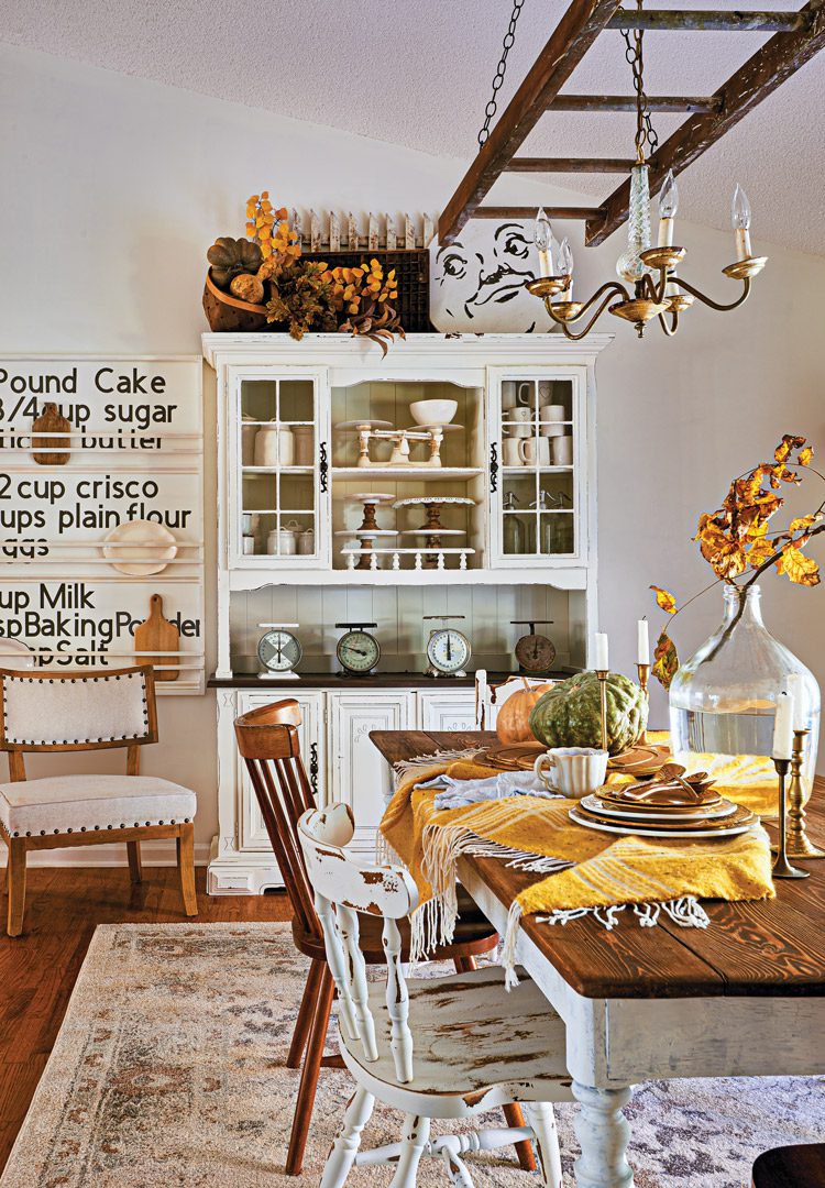 dining room with mustard accents and vintage ladder