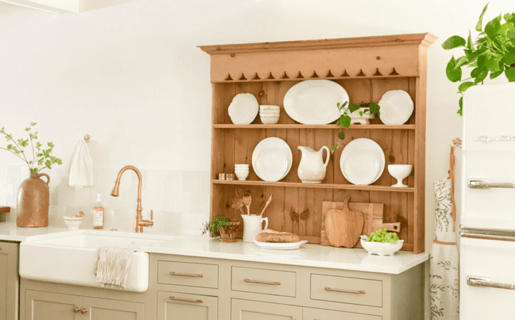 kitchen with new cabinets and antique hutch top on countertop to go vintage