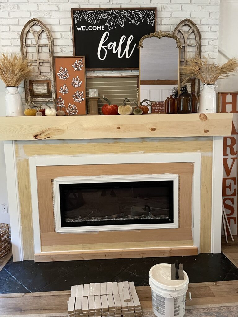 Fireplace makeover by Astra to create an inviting and cozy living room.