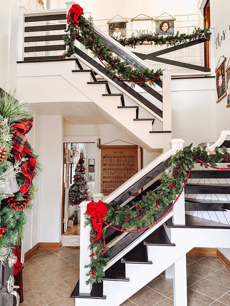 Staircase with black and white and Christmas decorations