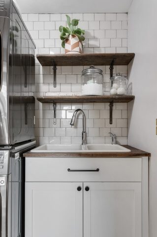 laundry room white subway tile, built-in shelves