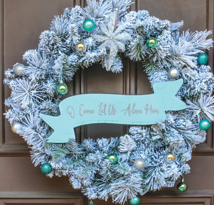 Christmas wreath on front door decorated