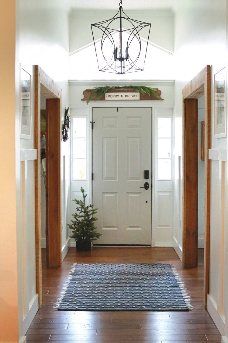 farmhouse entryway with fresh greenery