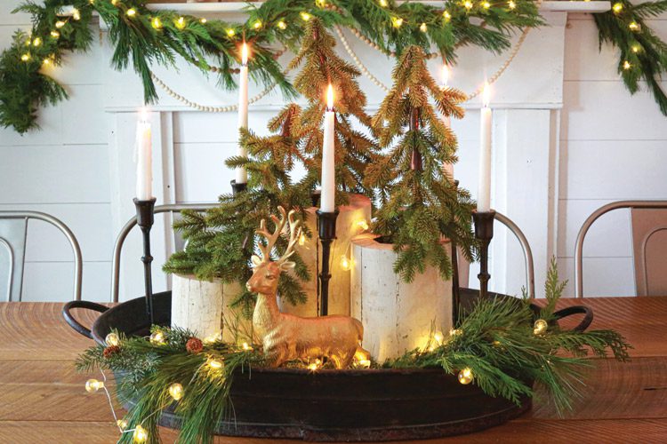 rustic Christmas centerpiece with wood and candles