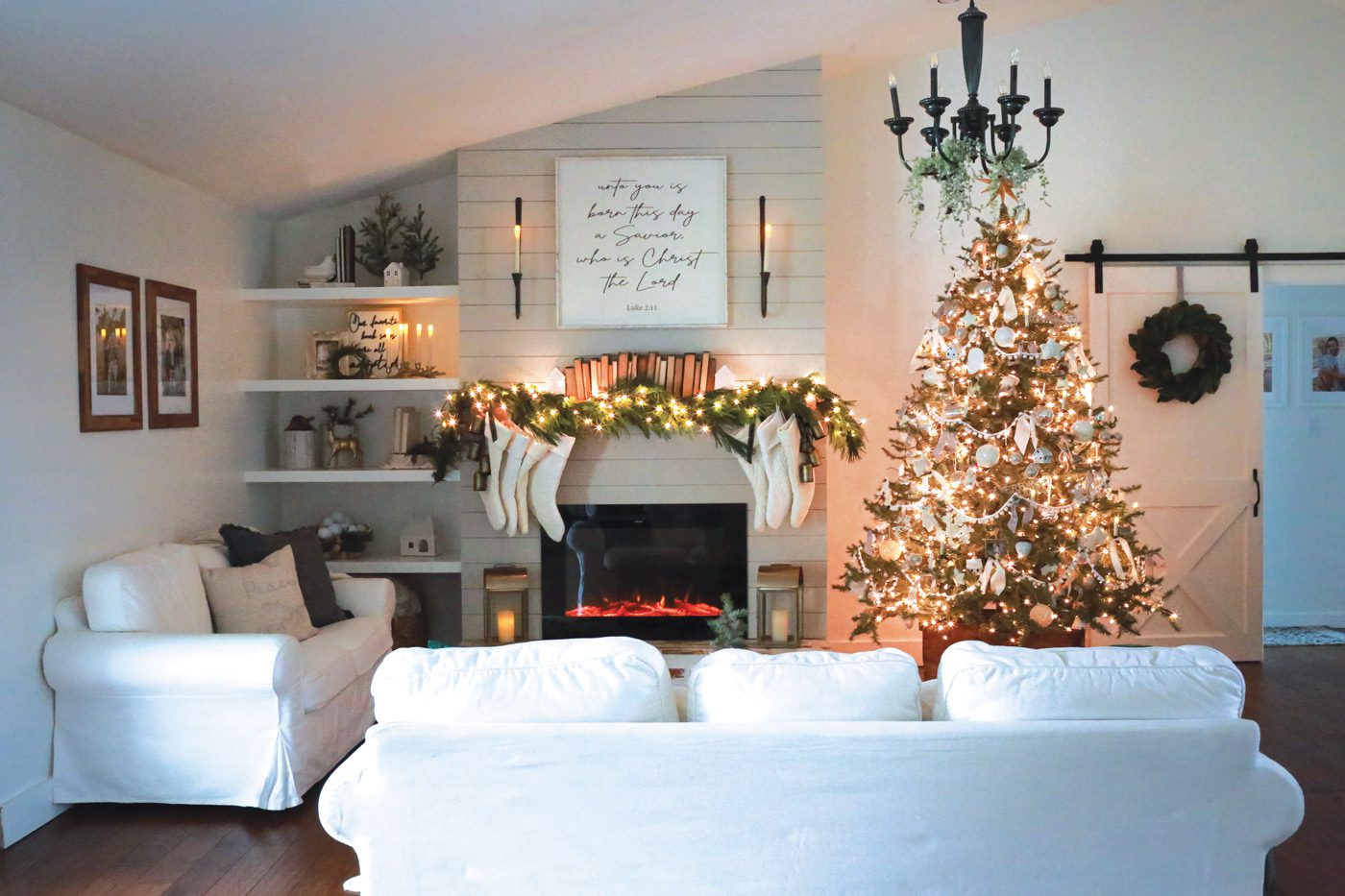family room with fresh Christmas greenery