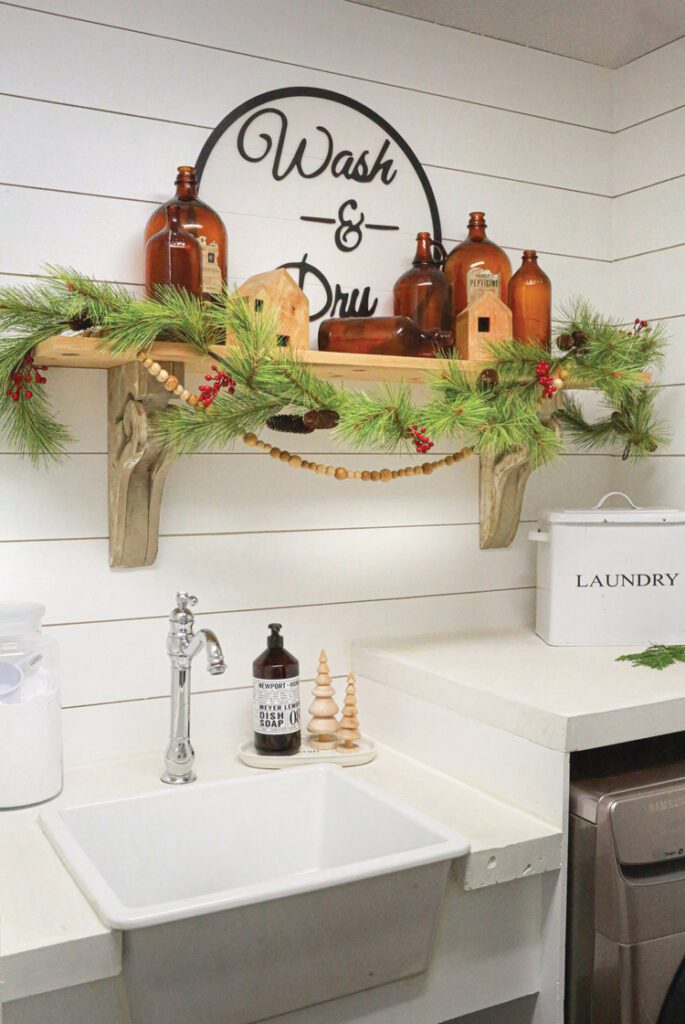 fresh garland and wooden beads laundry room Christmas decor