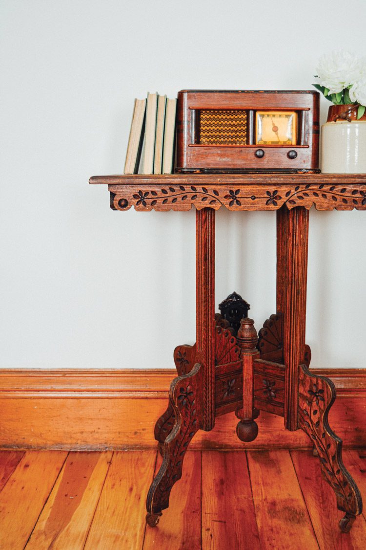 Eastlake sidetable with spoon carvings