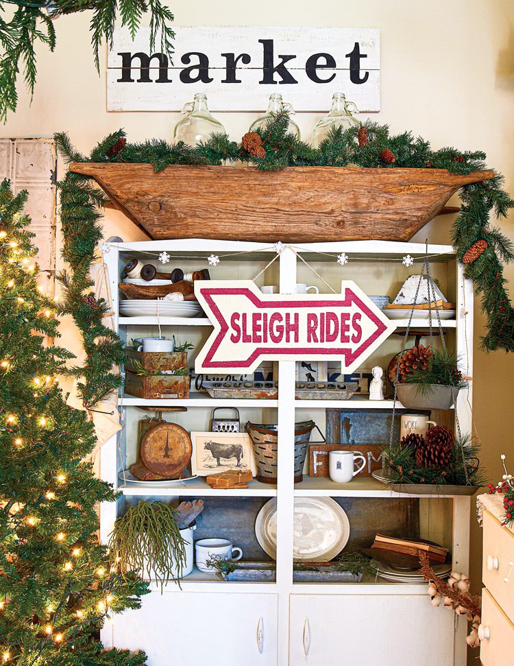 Christmas tree and garland in farmhouse style kitchen