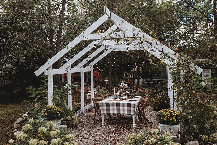 Fall she shed outdoor area with decorated table