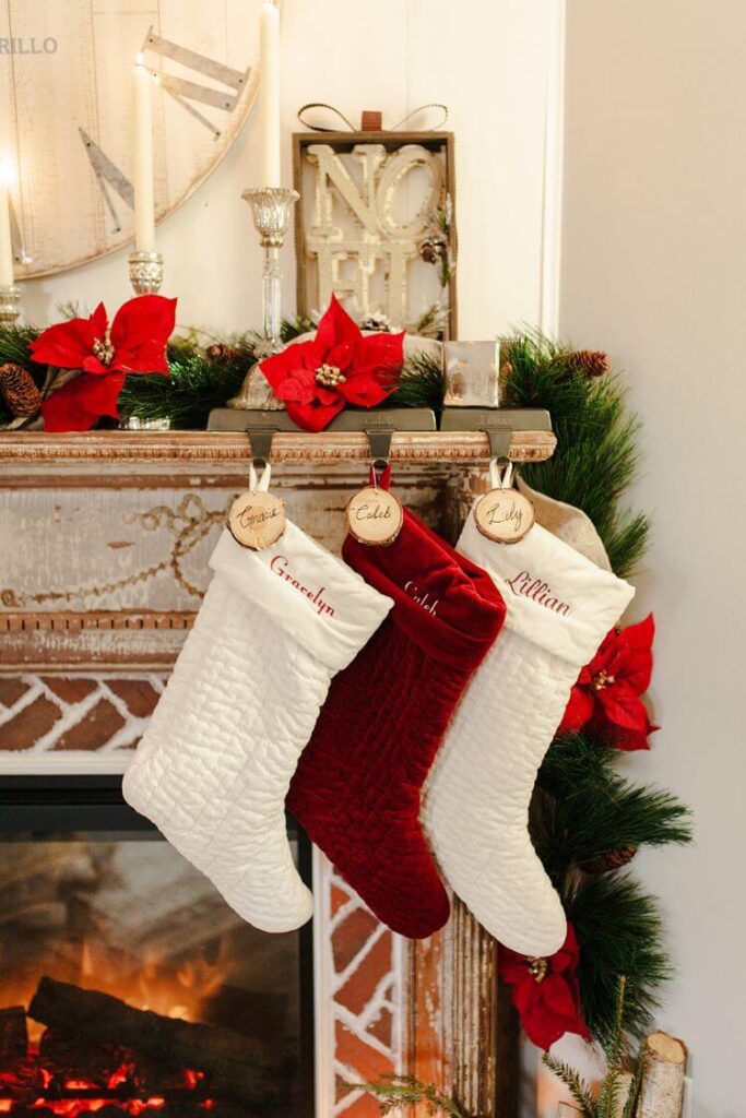 Three Christmas stockings hang with care from this Pennsylvania Christmas home's mantel.