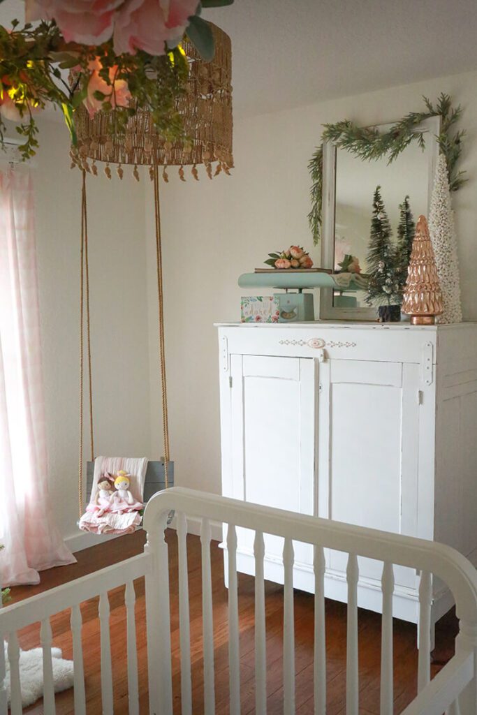 christmas garlands and mercury glass tree in nursery