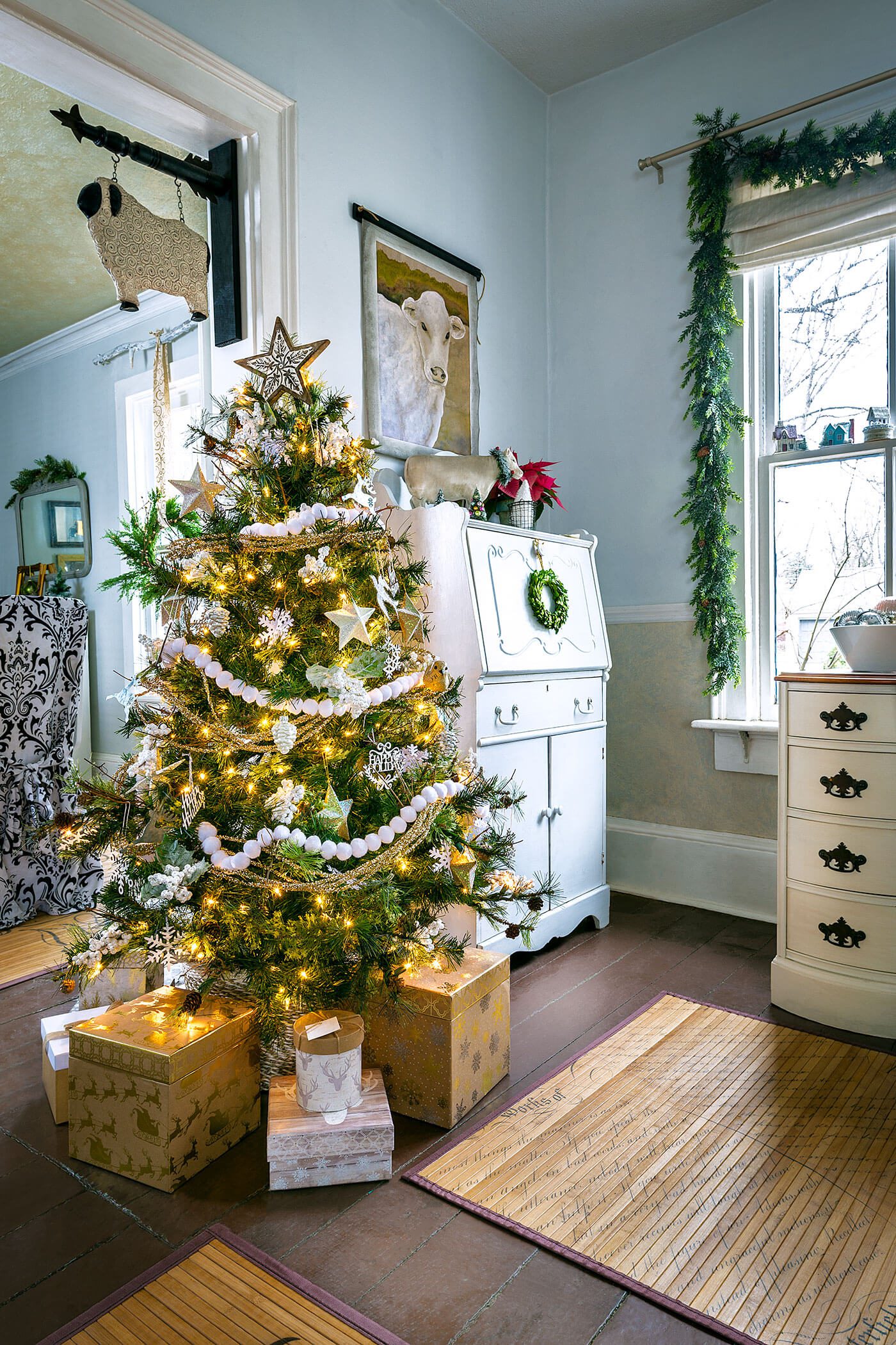 Christmas tree next to doorway to decorate with lights at Christmastime