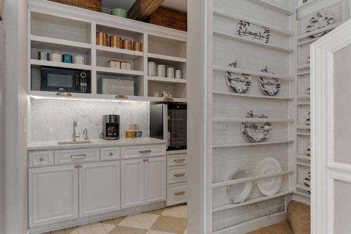 kitchen pantry with exposed shelves