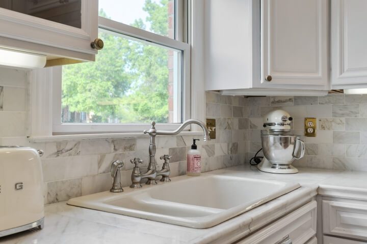 marble tile counter and backsplash