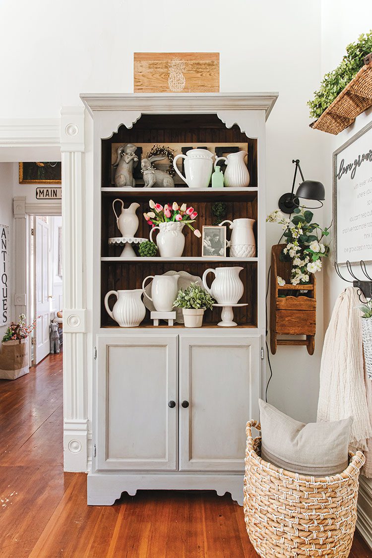 hutch with flowers in historic Utah home