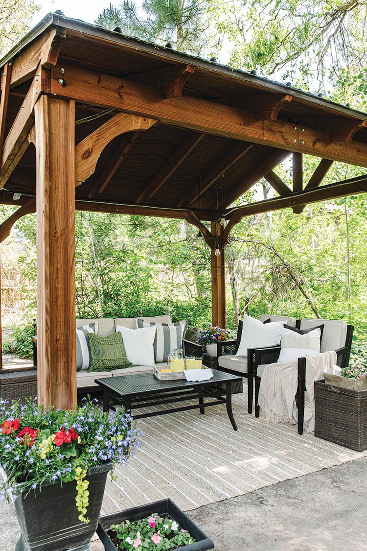 outdoor living area under pergola in historic Utah home