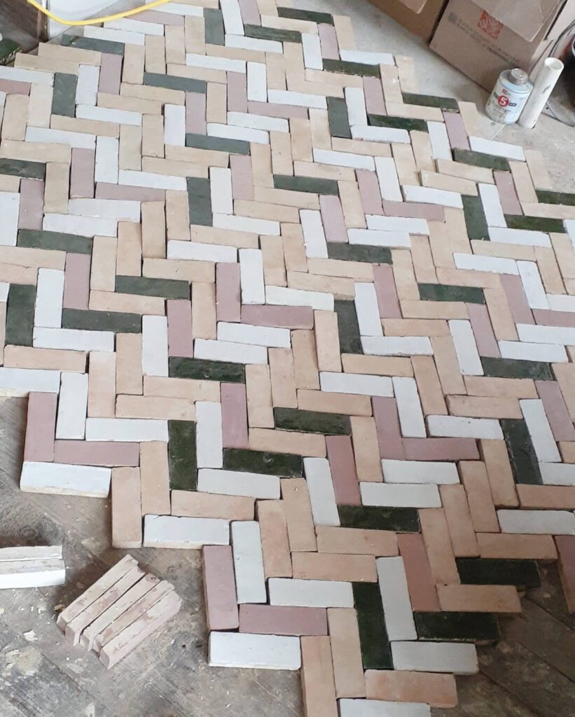 master bath floor herringbone multi colored brick