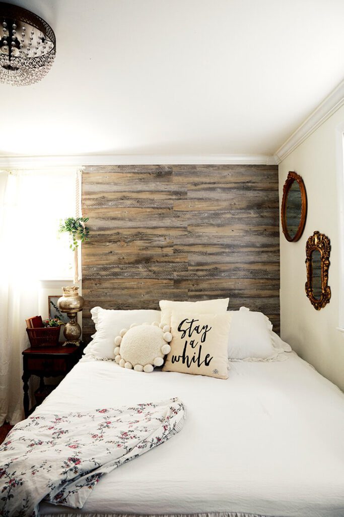 guest bedroom with wood accent wall