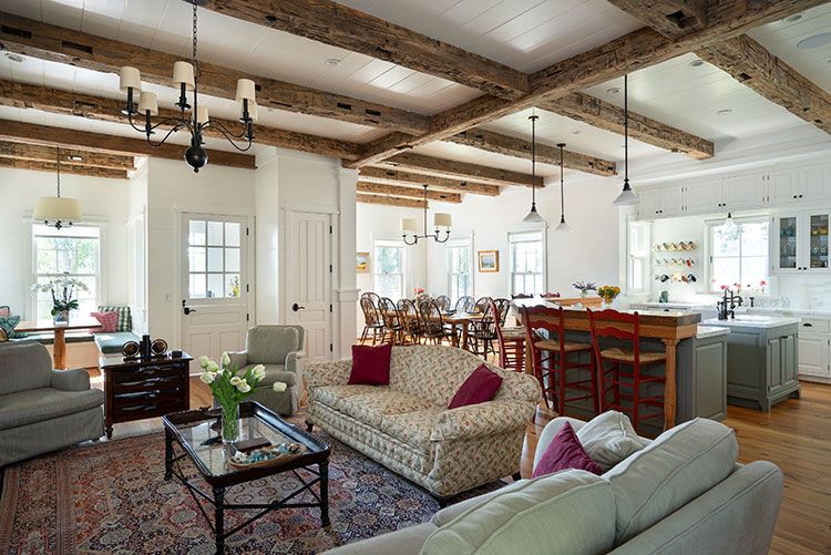 The home's great room offers a modern open floor plan turning what had been three smaller rooms into one large space for a farmhouse refresh