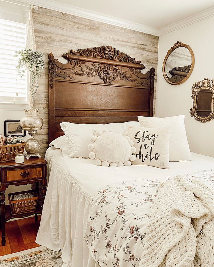 guest bedroom with wood headboard