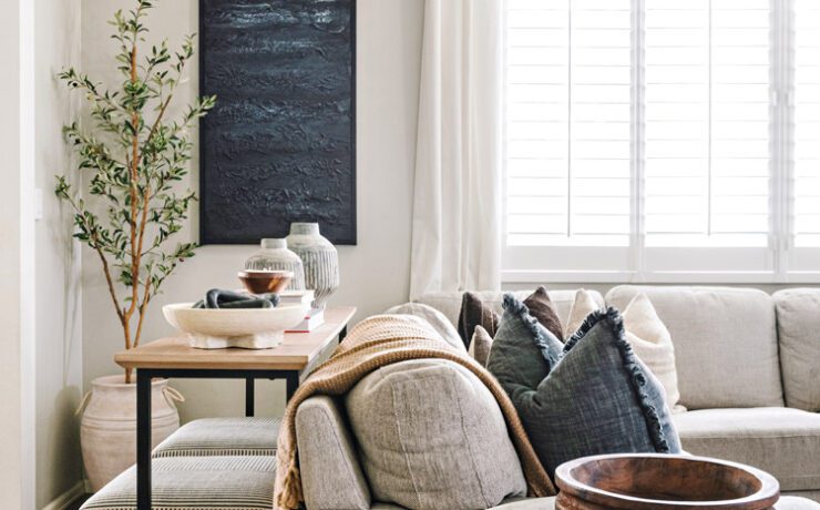 living room with chalkboard and clean lined furniture