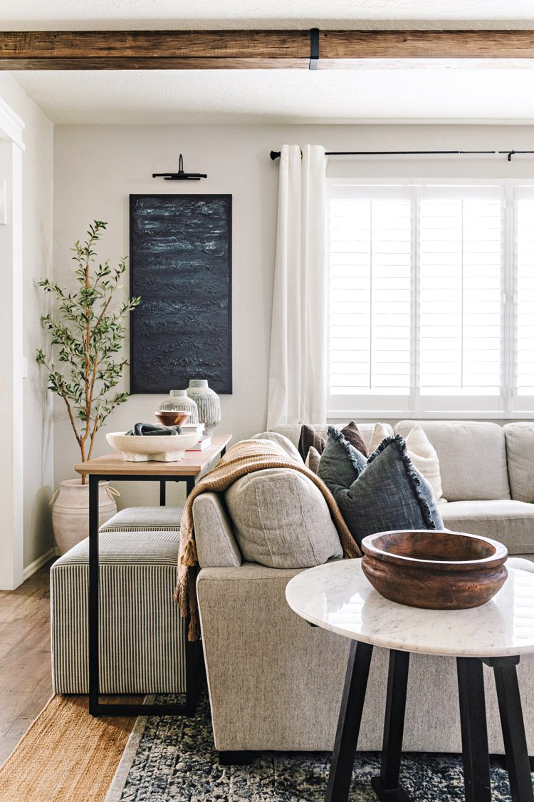 living room with chalkboard and clean lined furniture