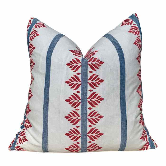 red white and blue pillow with red fern pattern