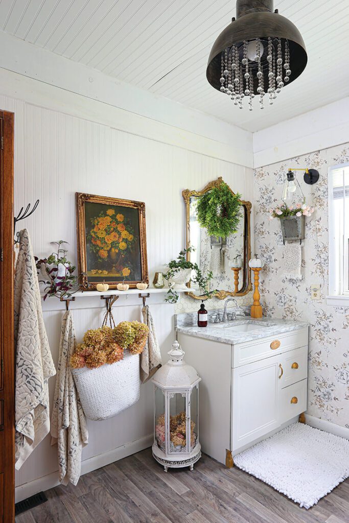 farmhouse powder room with floral painting