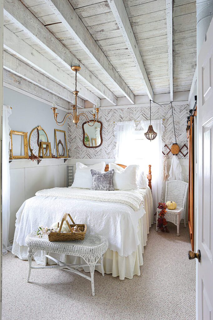white farmhouse bedroom with exposed wooden beams