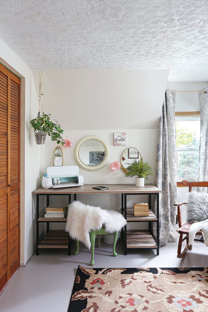 vintage farmhouse desk area with white throw