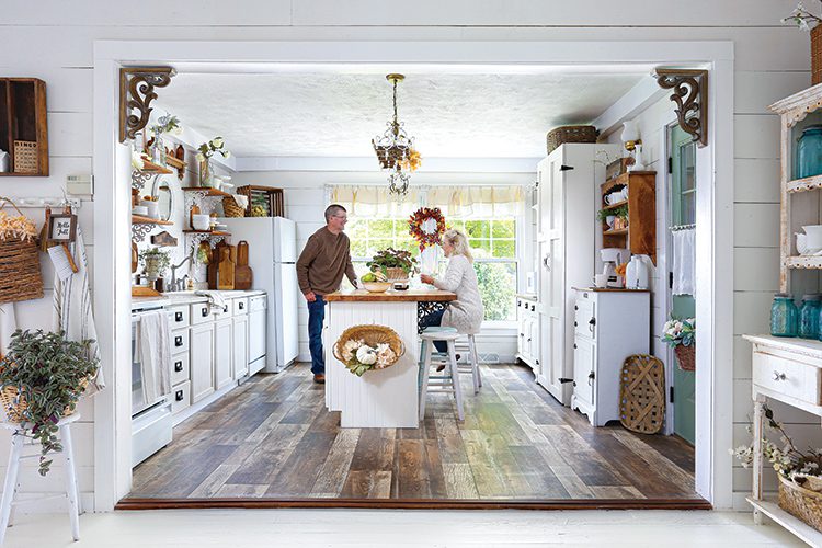 farmhouse kitchen with white cabinets, exposed shelves and island