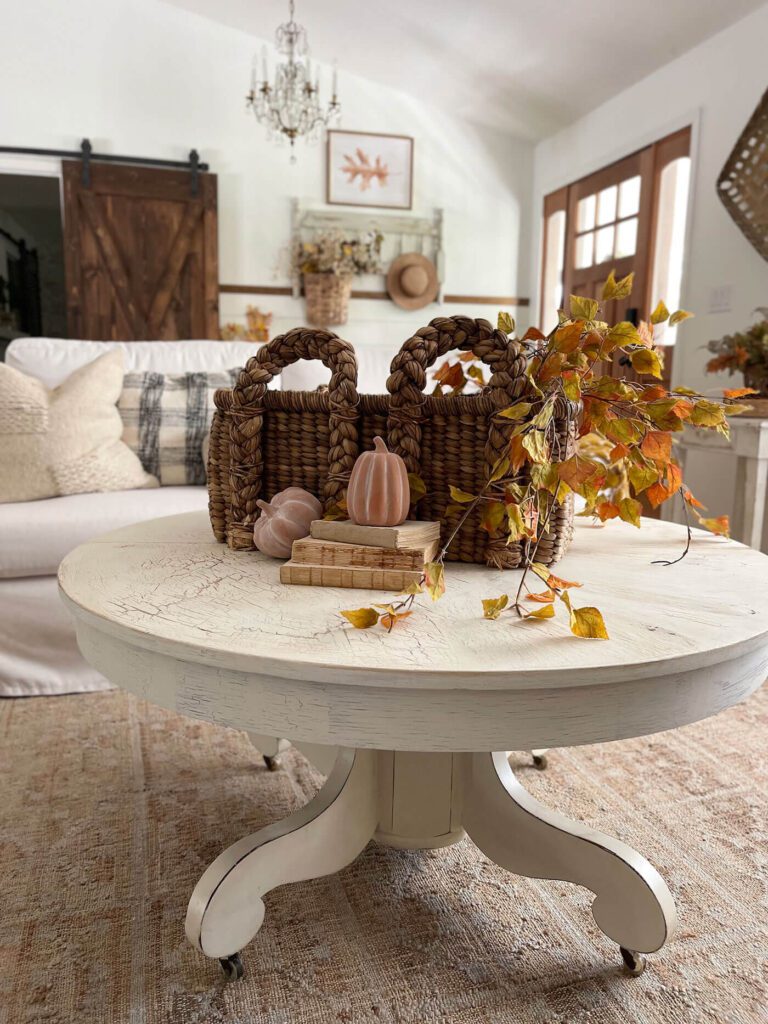 Painted white coffee table with cute fall styling on top