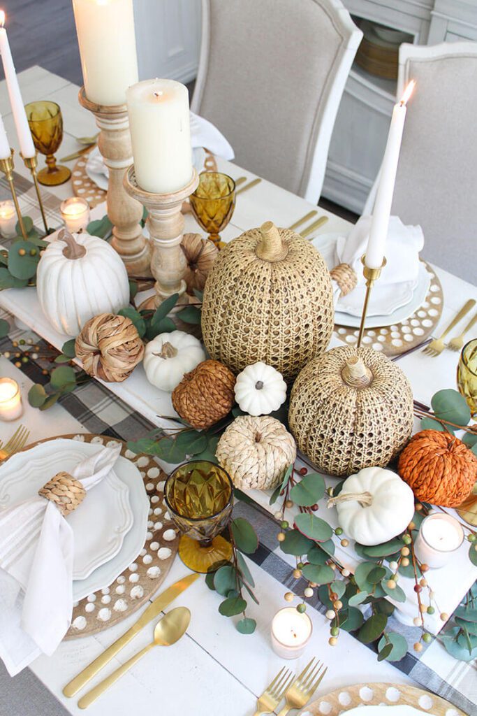pumpkins as a centerpiece for a Thanksgiving tablescape