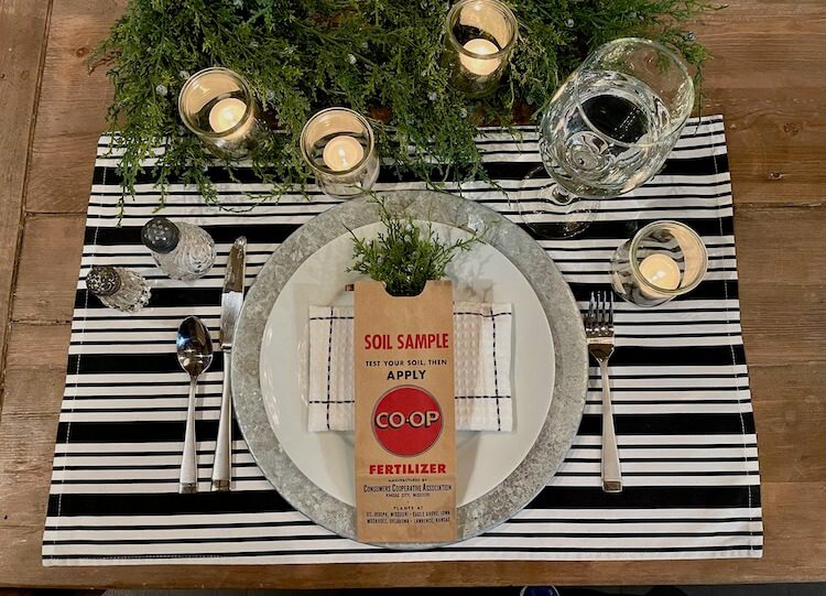 table setting using vintage soil sample sleeve