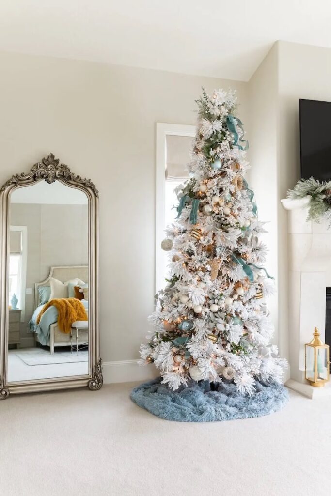 blue and white frosted christmas tree