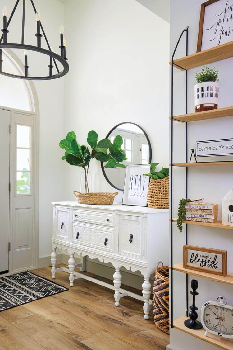 Entryway with open shelves and white walls