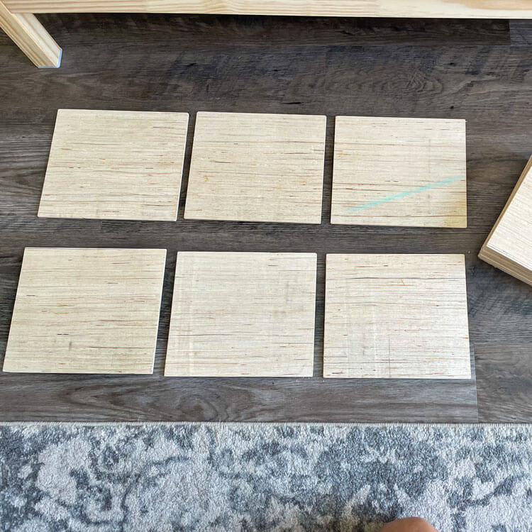 plywood cut into rectangles for DIY apothecary cabinet