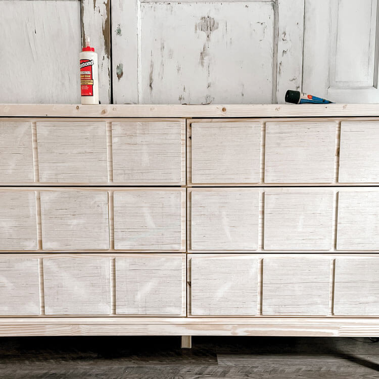 trim on top and bottom of dresser for apothecary cabinet