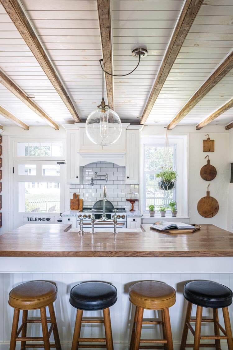 transparent pendant light in historic home kitchen