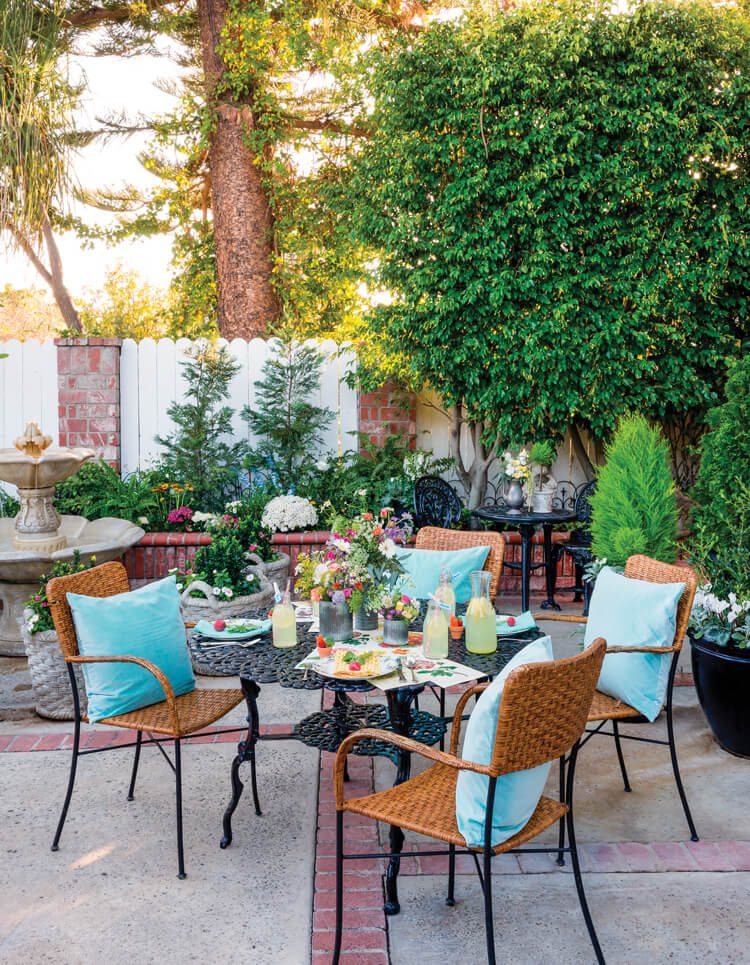 Spring garden party on table on outdoor patio