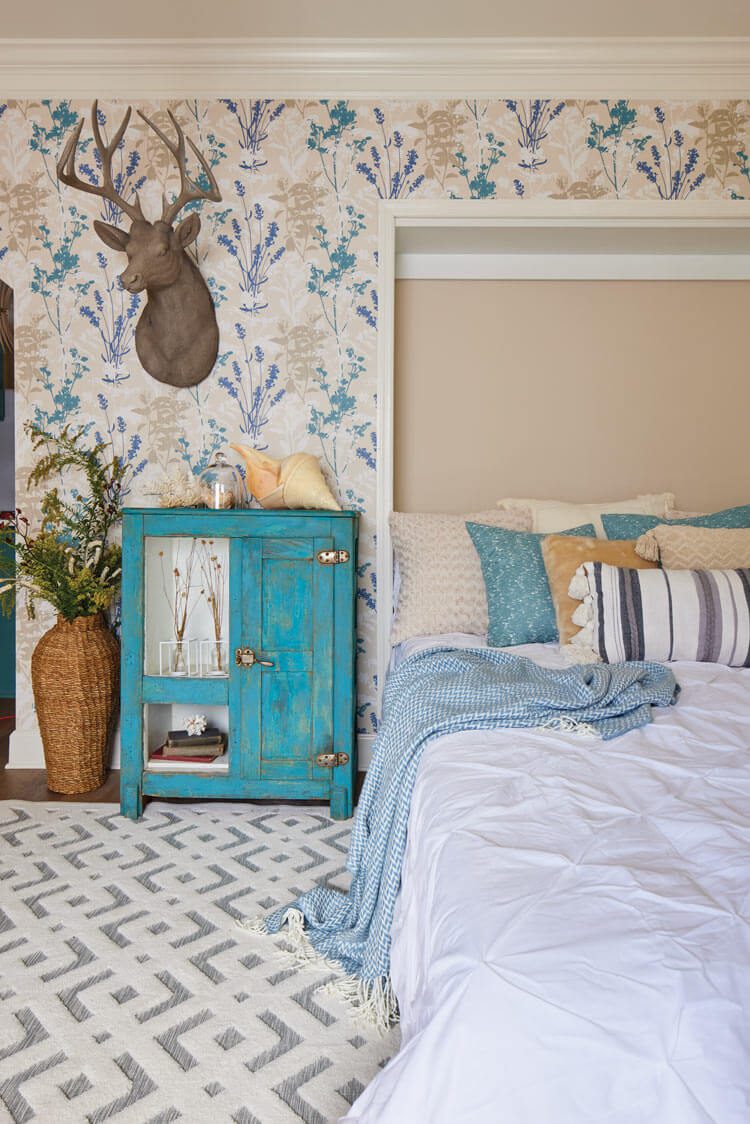 Cindy villa bedroom with floral wallpaper at the Villas at Spanish Court