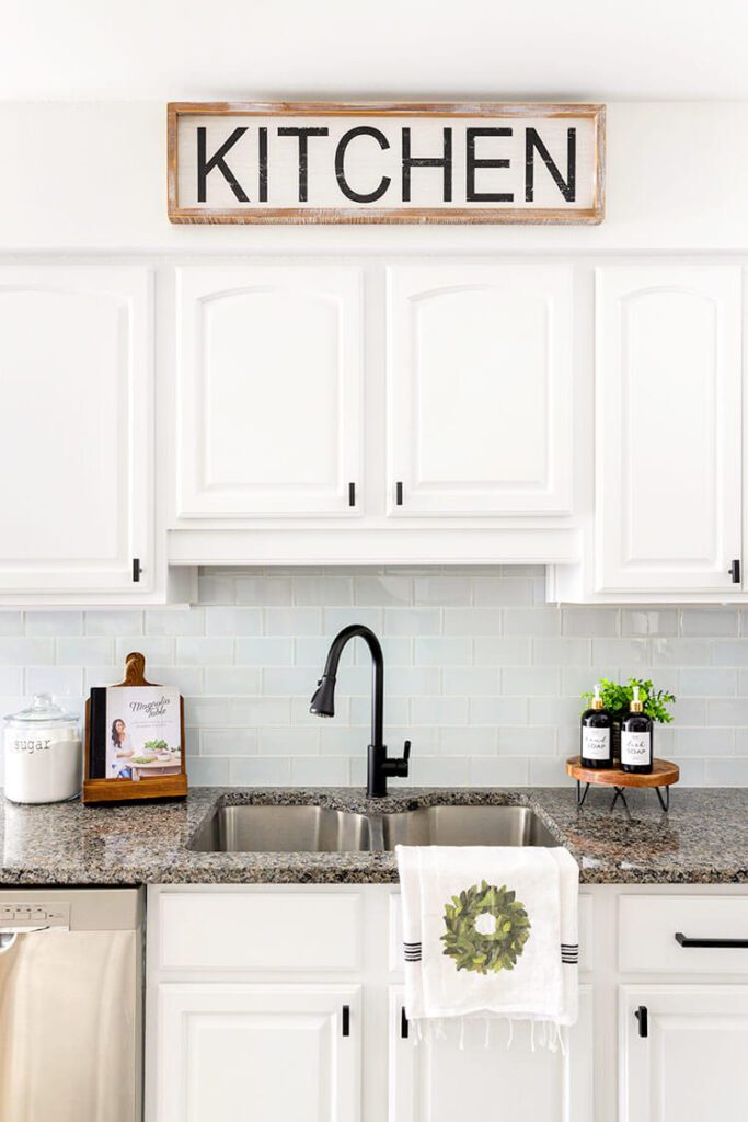 White kitchen with white subway tile backsplash