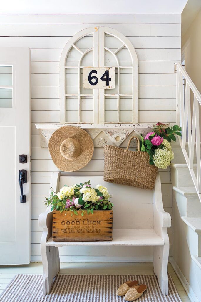 entryway with vintage window and vintage sign