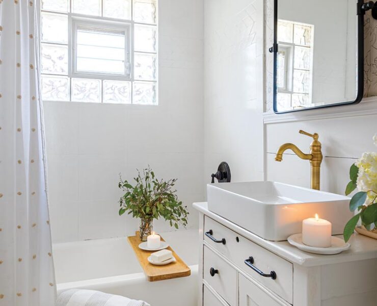 bathroom with refinished bathtub and repurposed dresser vanity