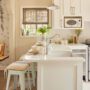 Kitchen with white countertops, cream walls and farmhouse style