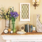 vintage corbel and stained glass window repurposed as decor