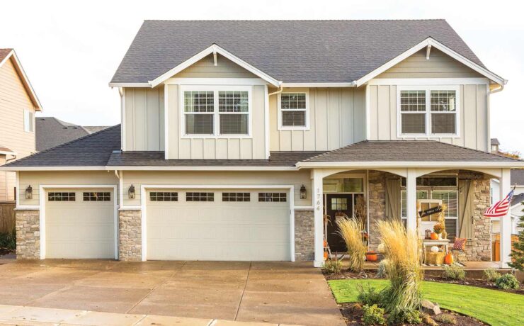 exterior of home with porch decorated for fall