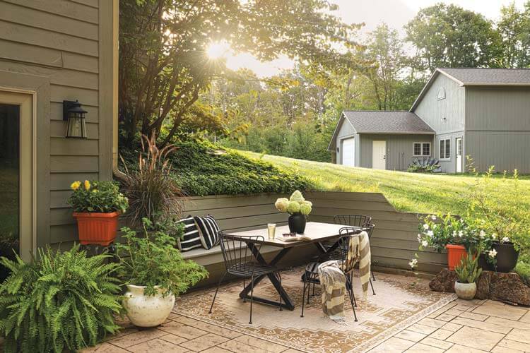 patio with dining nook and outdoor rug